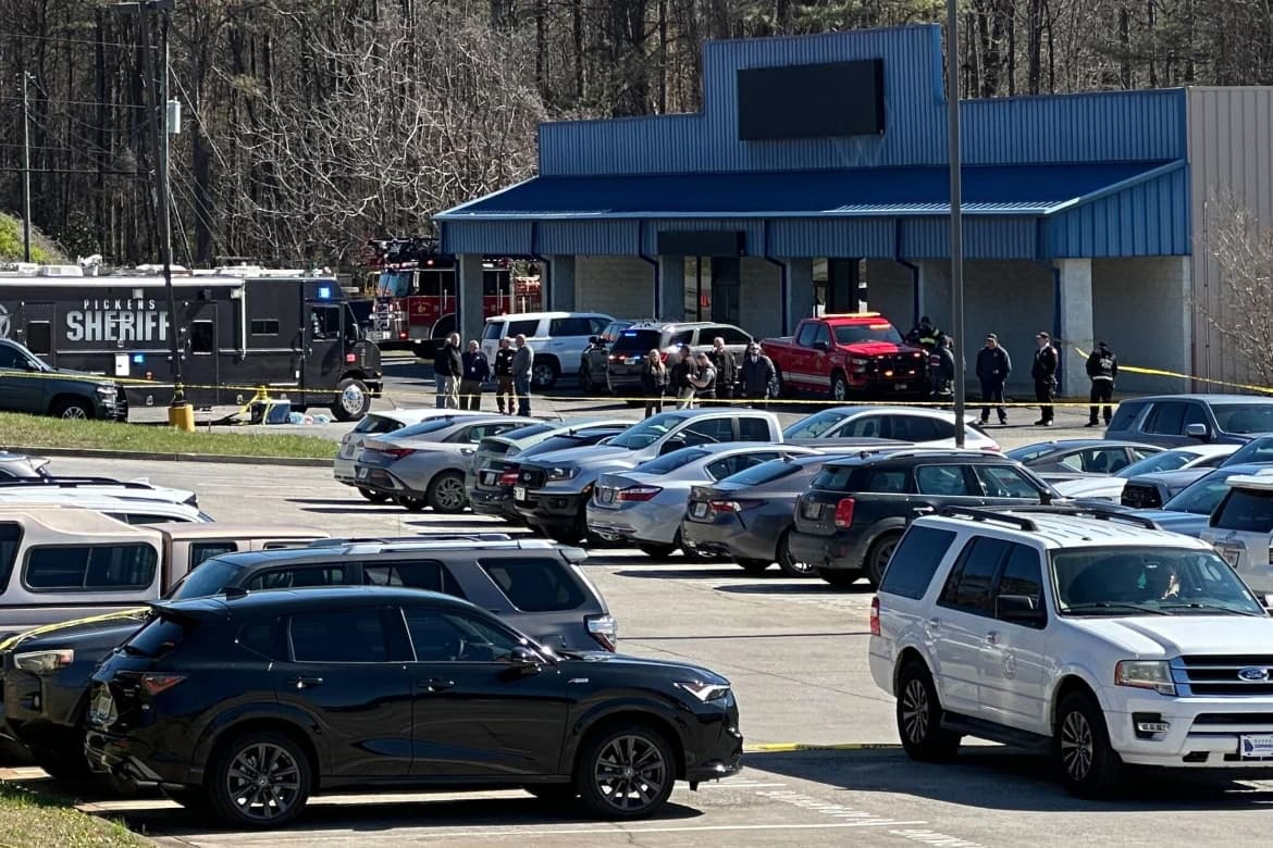 Gunman killed and employee hospitalized after a shooting at a Georgia VA clinic, police say Gunman killed and employee hospitalized after a shooting at a Georgia VA clinic, police say