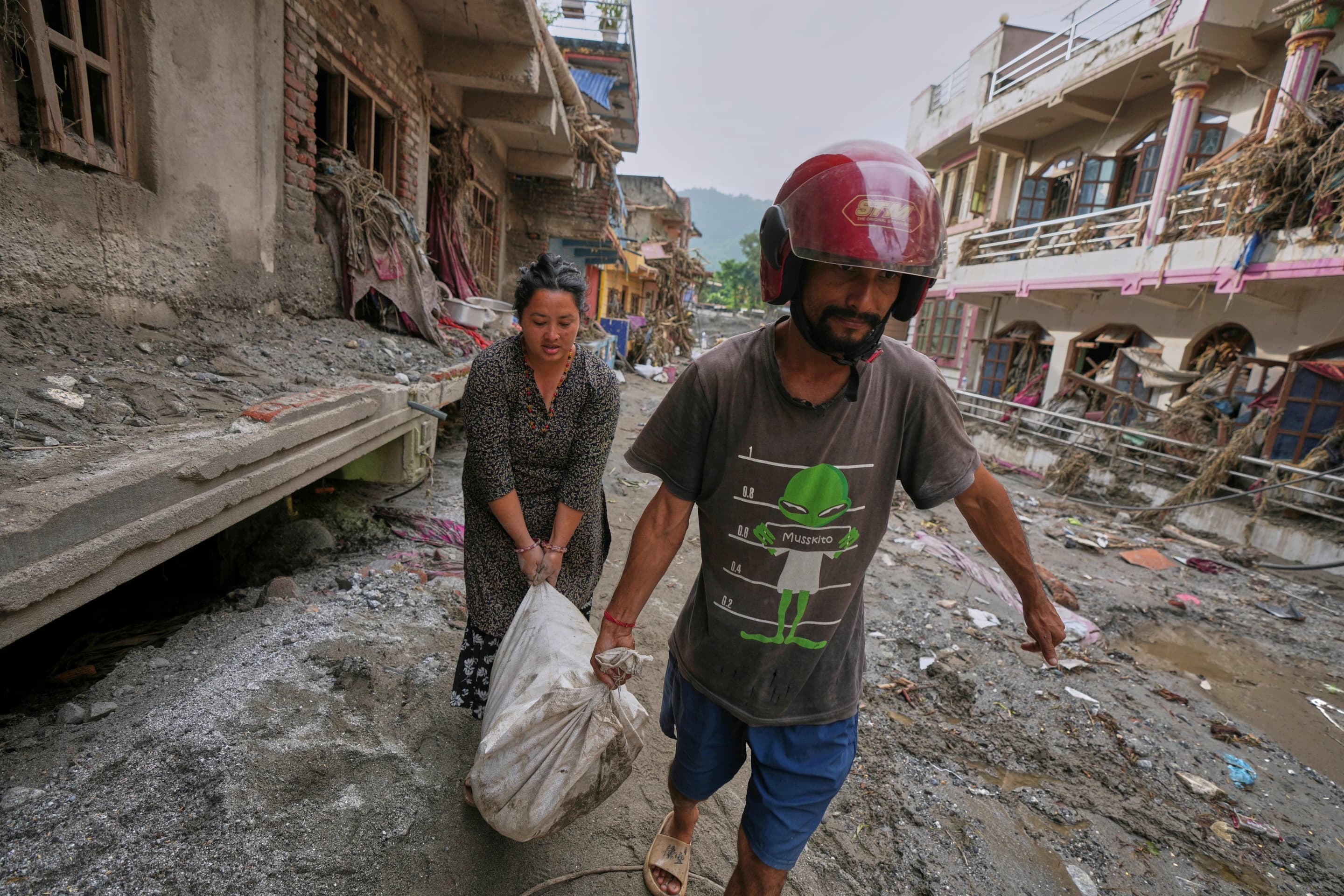 Nepal-China Flood Survivors Reach Safe Areas as Families Await News of Nearly 3,000 Missing